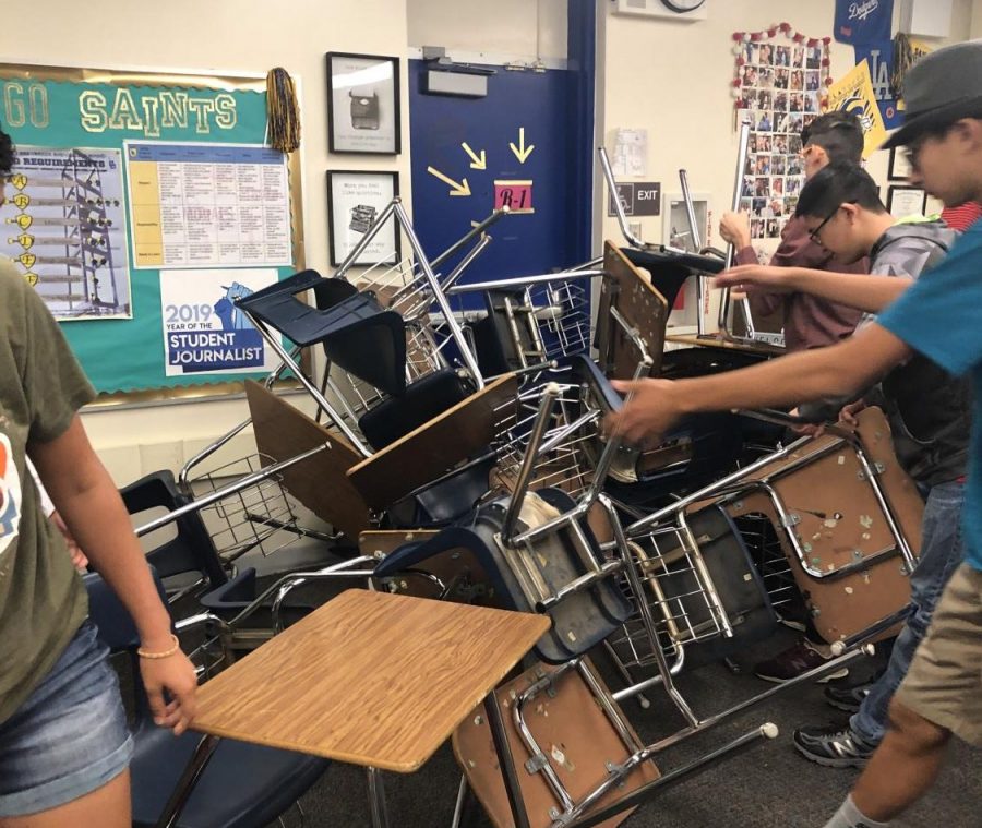 Students build barricade during lock down.