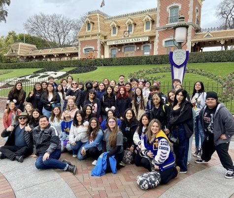 Choir students in front of Disneyland