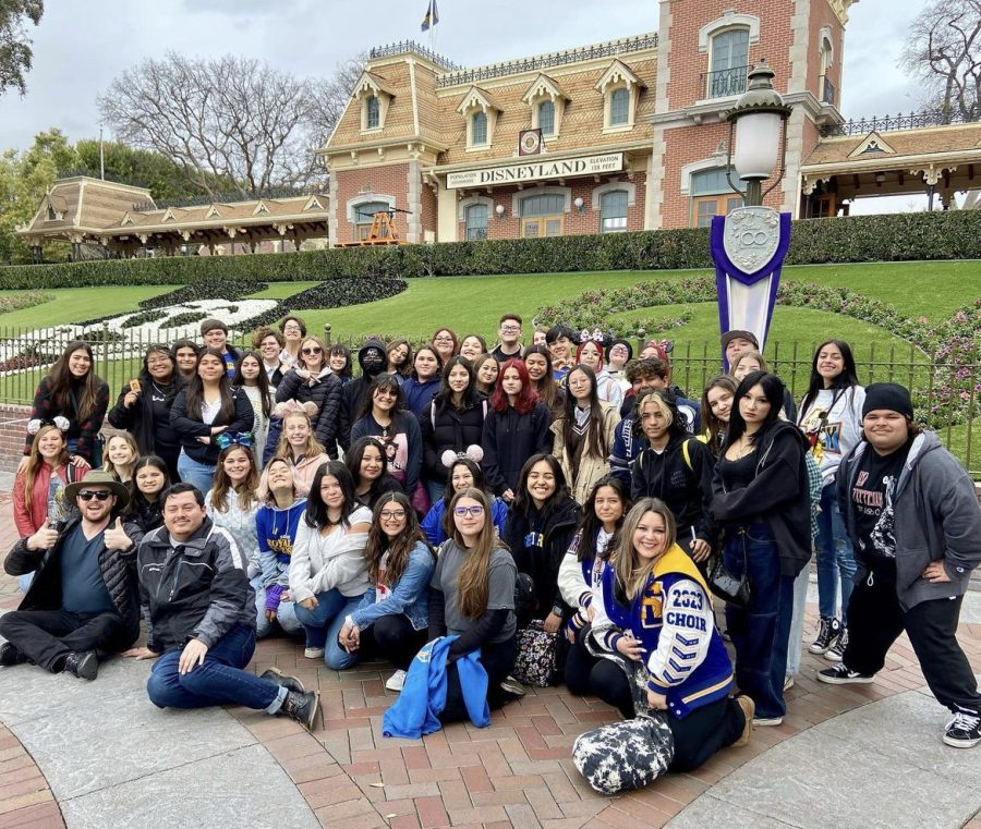 Choir students in front of Disneyland