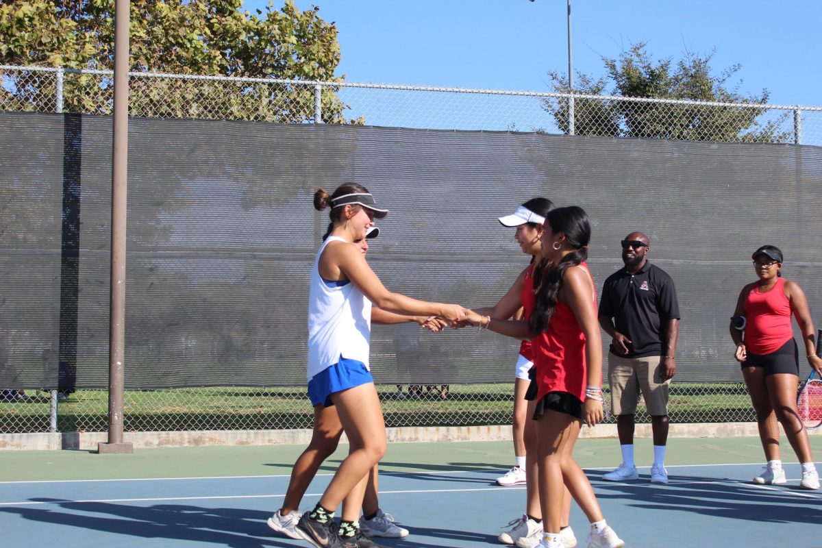 Girls Tennis Takes League Champions