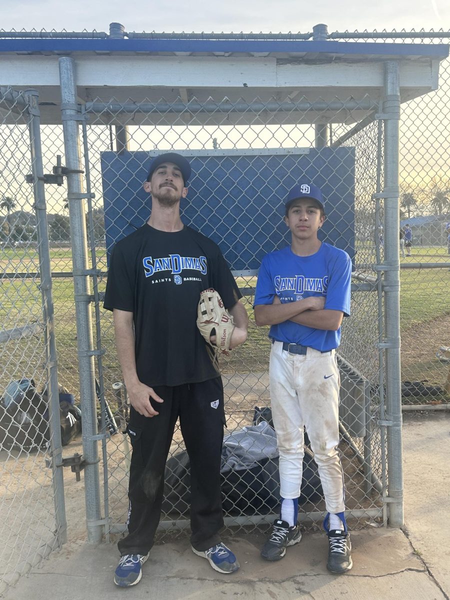 Coach David Vera with one of his players Cesar Almazan